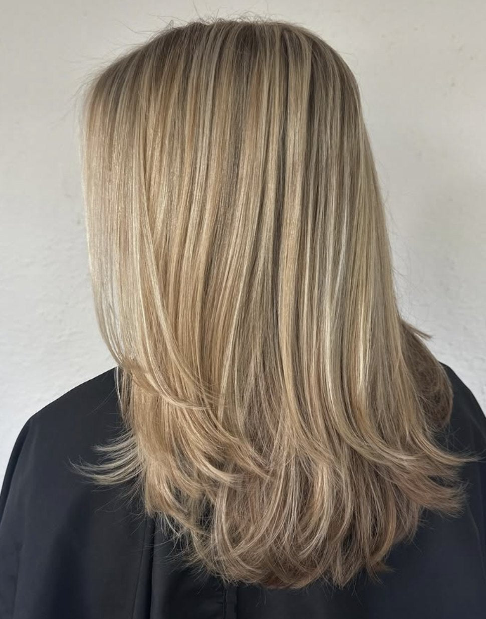 Blonde layered balayage at Elevate Salon + Spa, Charlottesville VA
