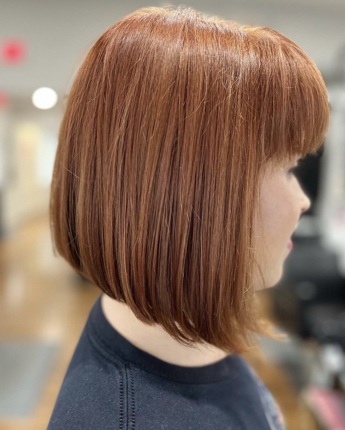 Copper bob with bangs at Elevate Salon + Spa, Charlottesville VA