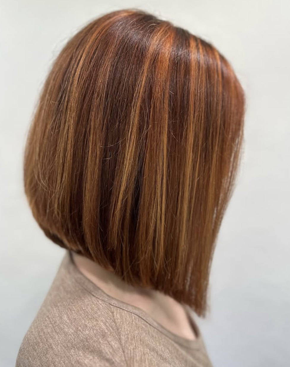 Copper bob with highlights at Elevate Salon + Spa, Charlottesville VA