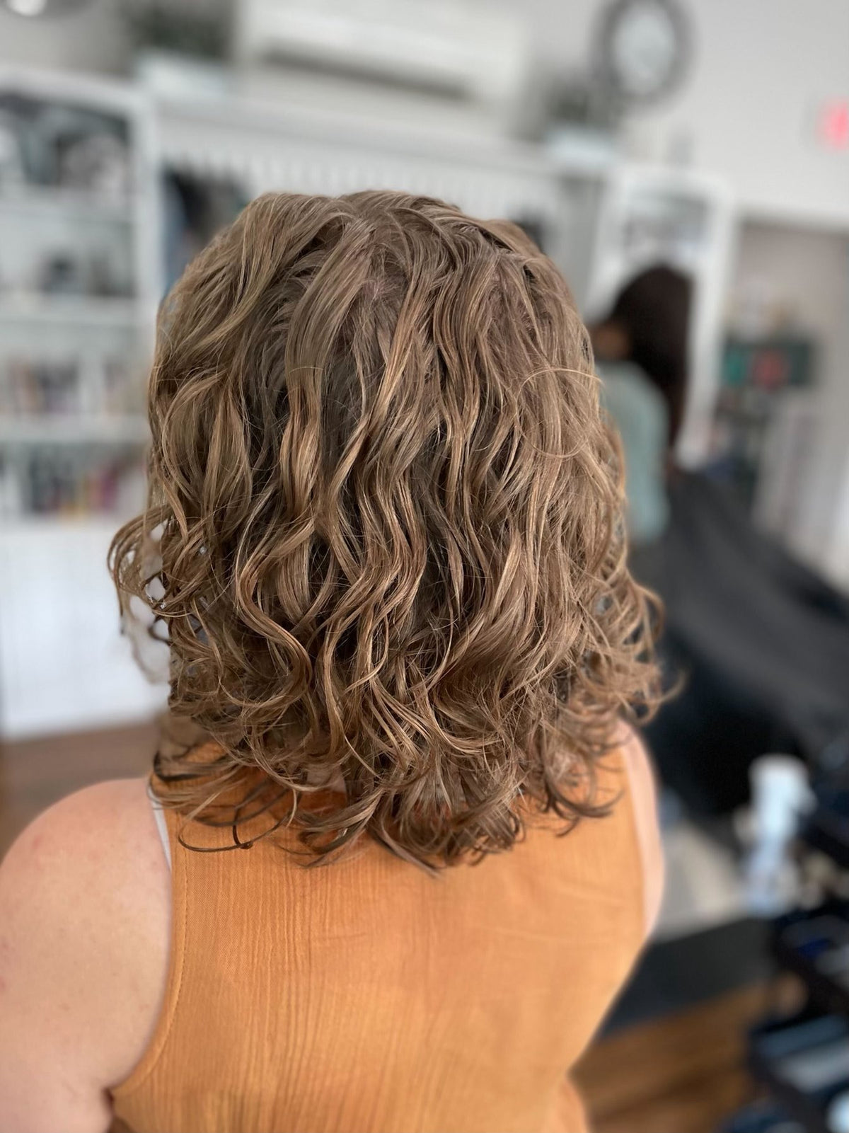 Curly bronde bob at Elevate Salon + Spa, Charlottesville VA
