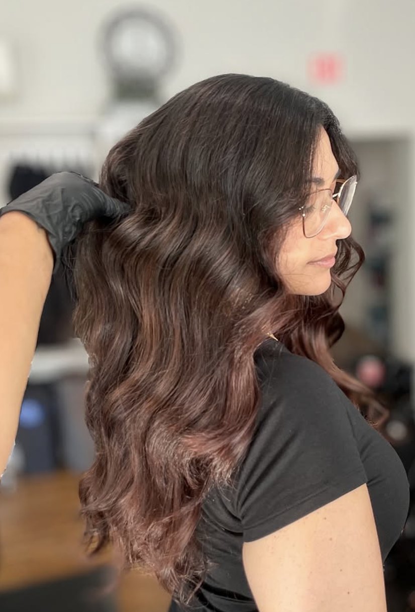 Dark brunette with red tones at Elevate Salon + Spa, Charlottesville VA