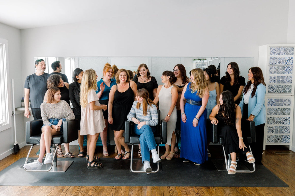 Elevate team group photo inside the salon at Elevate Salon + Spa, Charlottesville VA