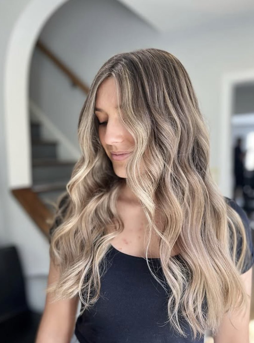 Face framing blonde balayage at Elevate Salon + Spa, Charlottesville VA