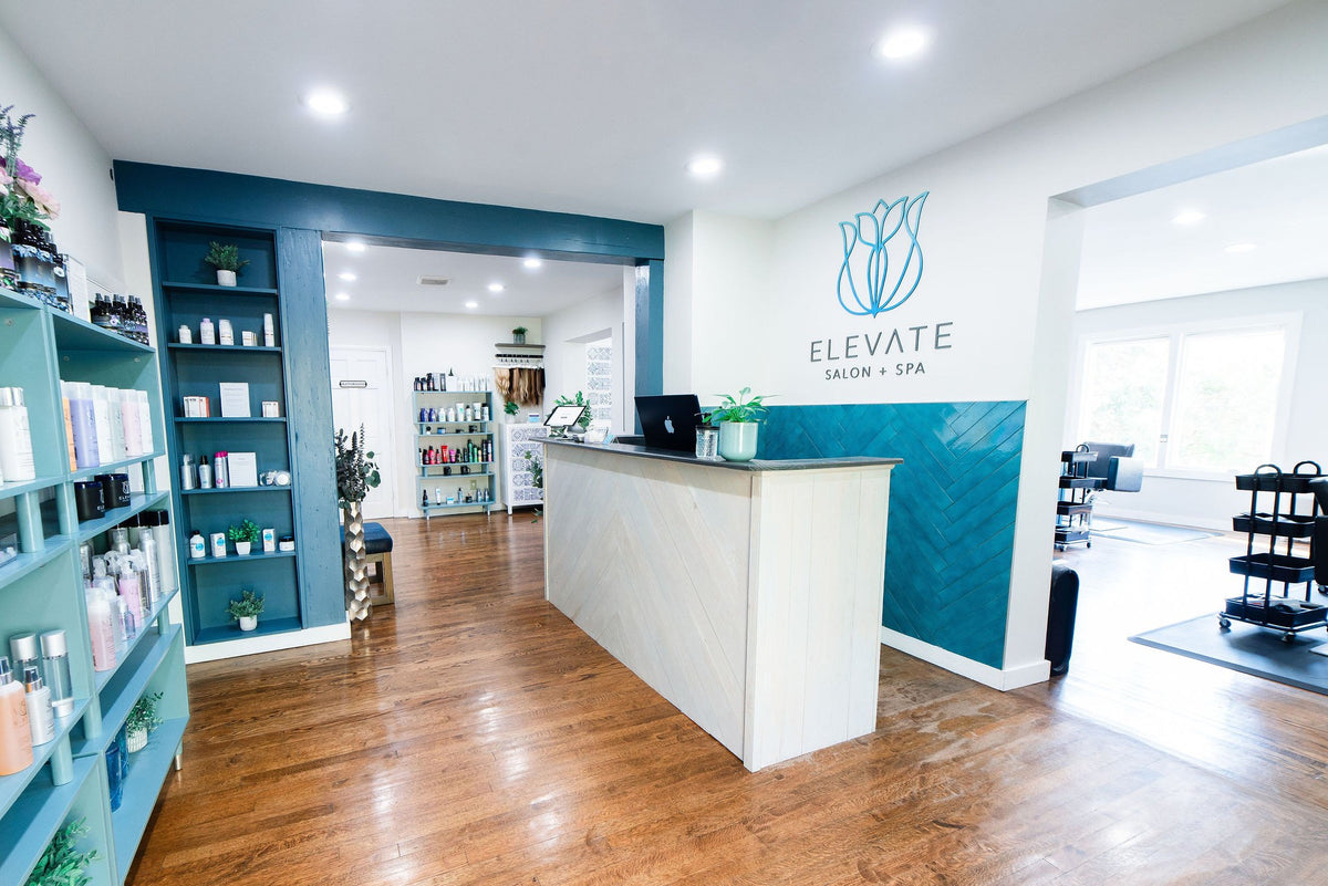 Front desk and retail wall at Elevate Salon + Spa, Charlottesville VA