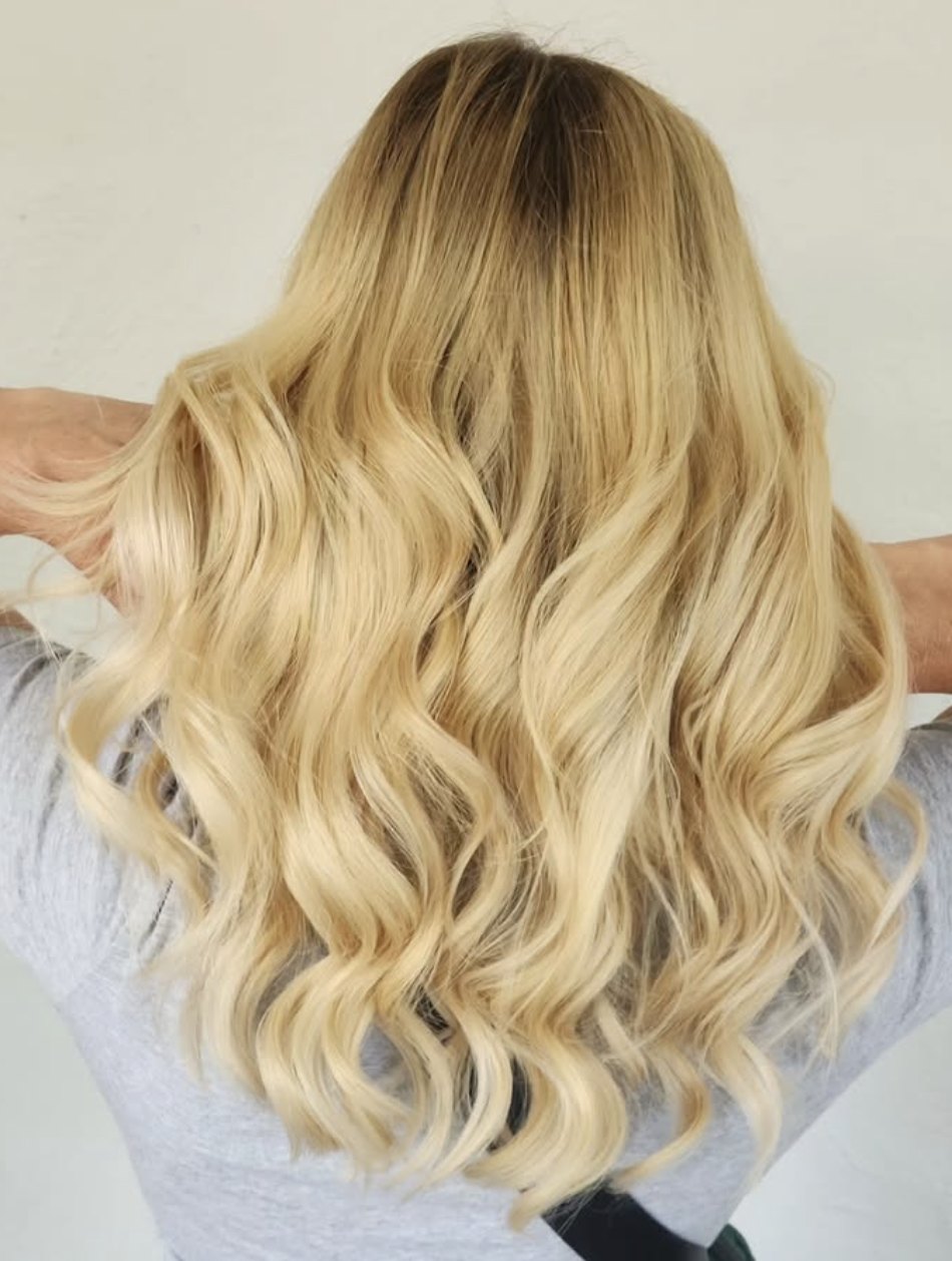 Golden blonde curls at Elevate Salon + Spa, Charlottesville VA
