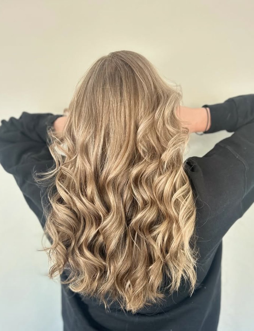 Golden blonde curls at Elevate Salon + Spa, Charlottesville VA