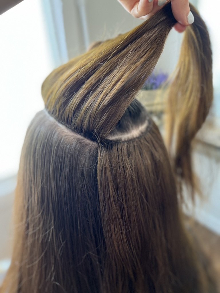 Hand tied extension row install at Elevate Salon + Spa, Charlottesville VA