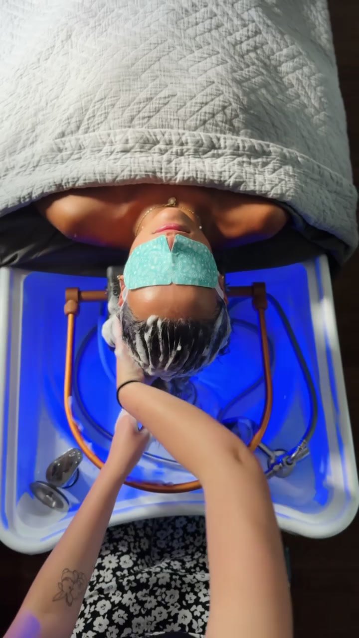 Head spa water therapy at Elevate Salon + Spa, Charlottesville VA