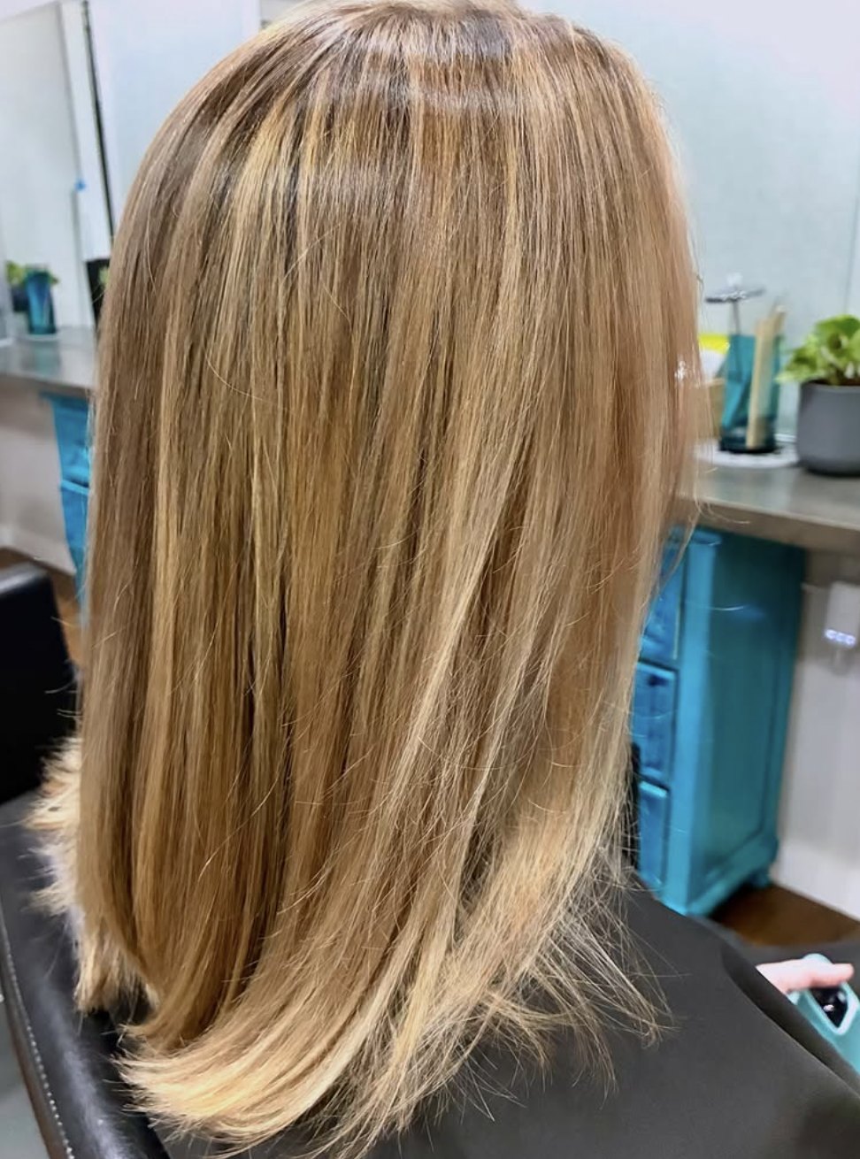 Layered blonde balayage at Elevate Salon + Spa, Charlottesville VA