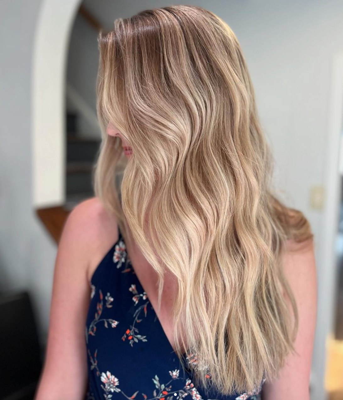 Long blended blonde balayage waves at Elevate Salon + Spa, Charlottesville VA