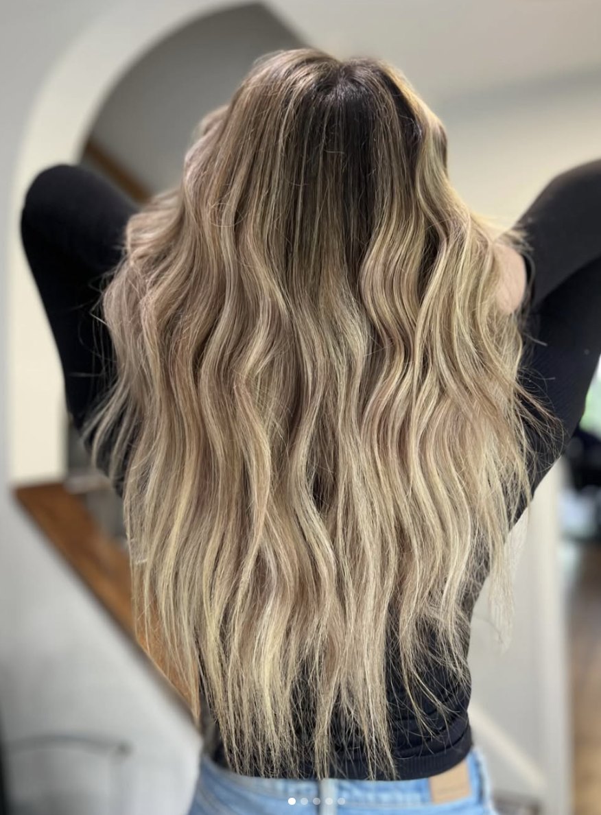 Long blonde balayage waves at Elevate Salon + Spa, Charlottesville VA