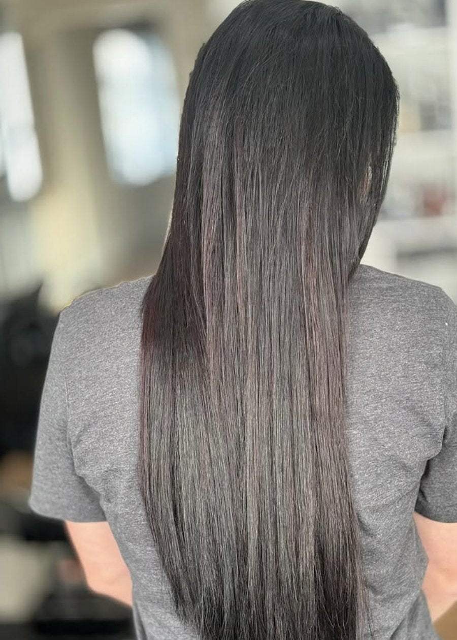 Long sleek dark brunette extensions at Elevate Salon + Spa, Charlottesville VA