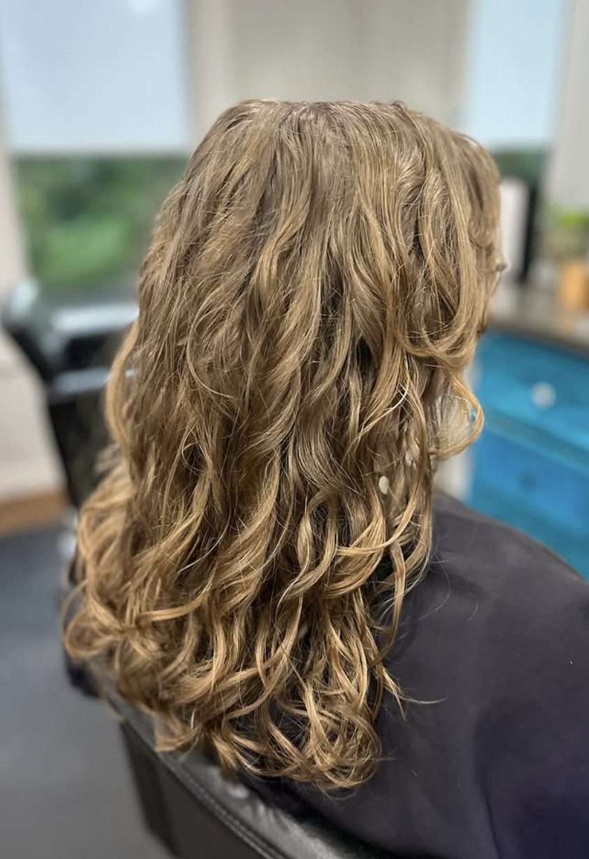 Textured blonde curls at Elevate Salon + Spa, Charlottesville VA