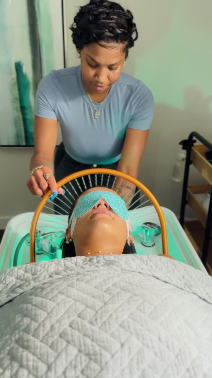 Therapist performing a head spa ritual at Elevate Salon + Spa, Charlottesville VA