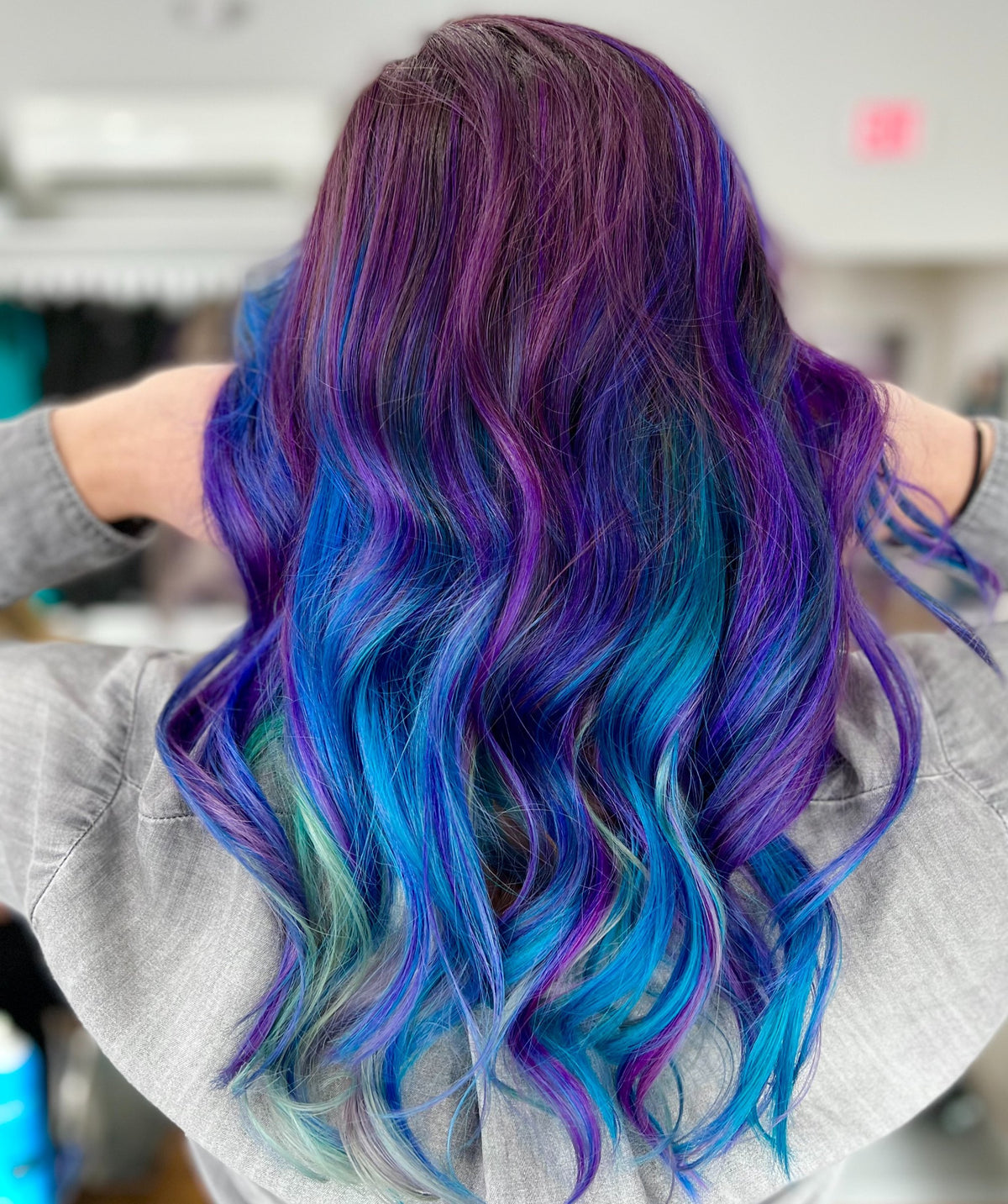 Vivid purple and blue waves at Elevate Salon + Spa, Charlottesville VA